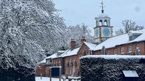 Snow covers the Clock Tower at Clumber Park